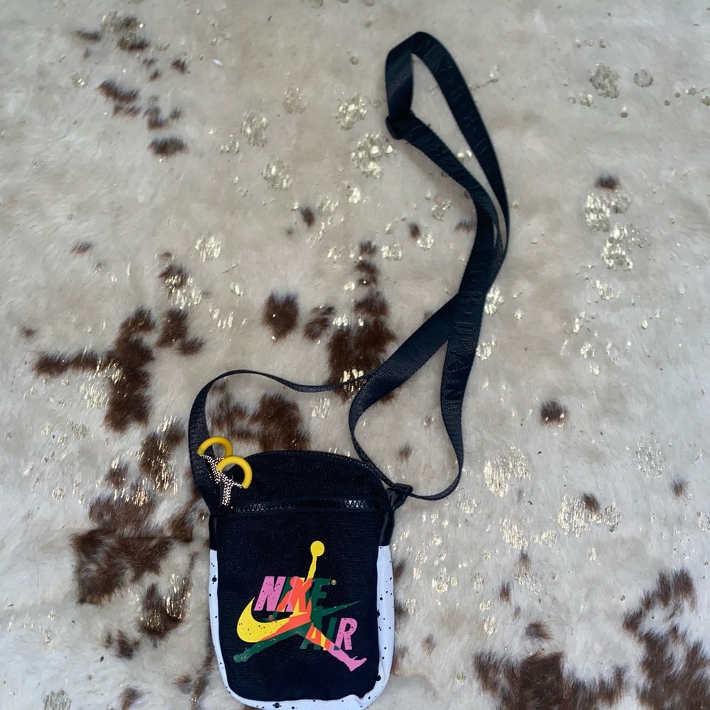 Nike Air cross over bag! Barely worn but very convenient and well worth it!